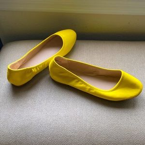 Bright yellow ballet pumps